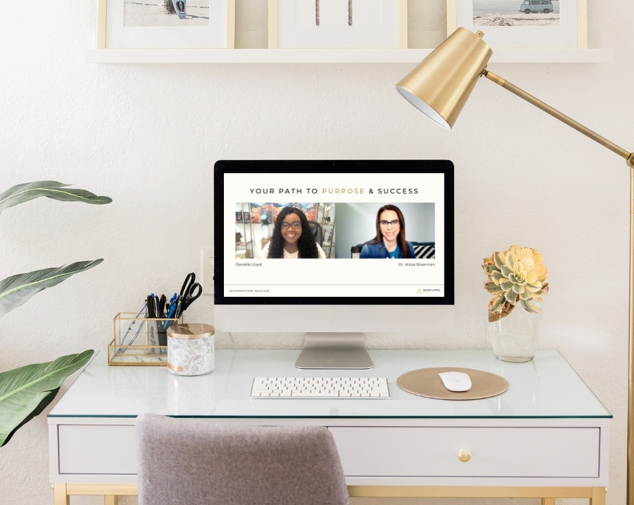 Aurum Lumos online life coach certification playing on computer
